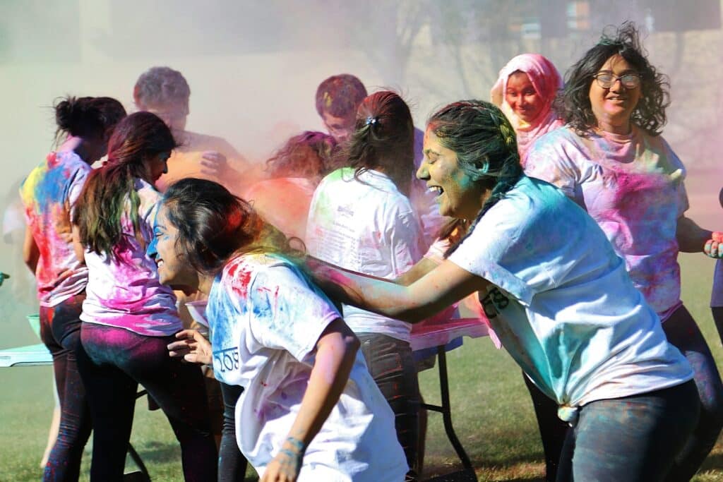 UHSP have fun with color powder as they celebrate International Week on campus