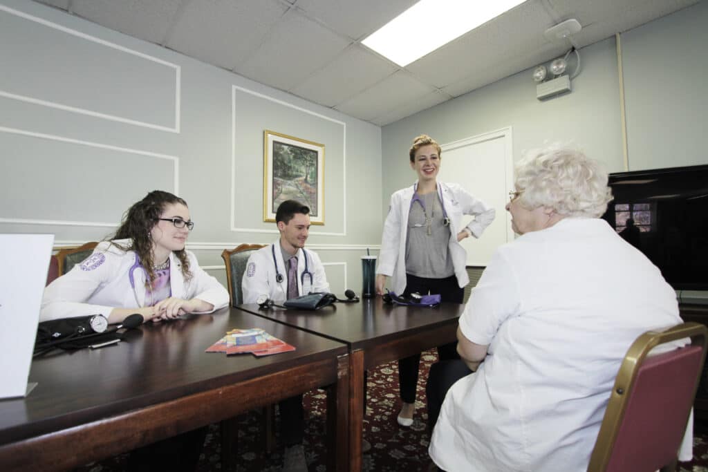 UHSP C.A.R.E.S. students and faculty provide health screenings.