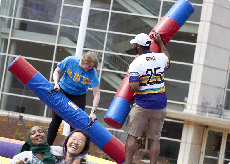 Students playing a game on campus.