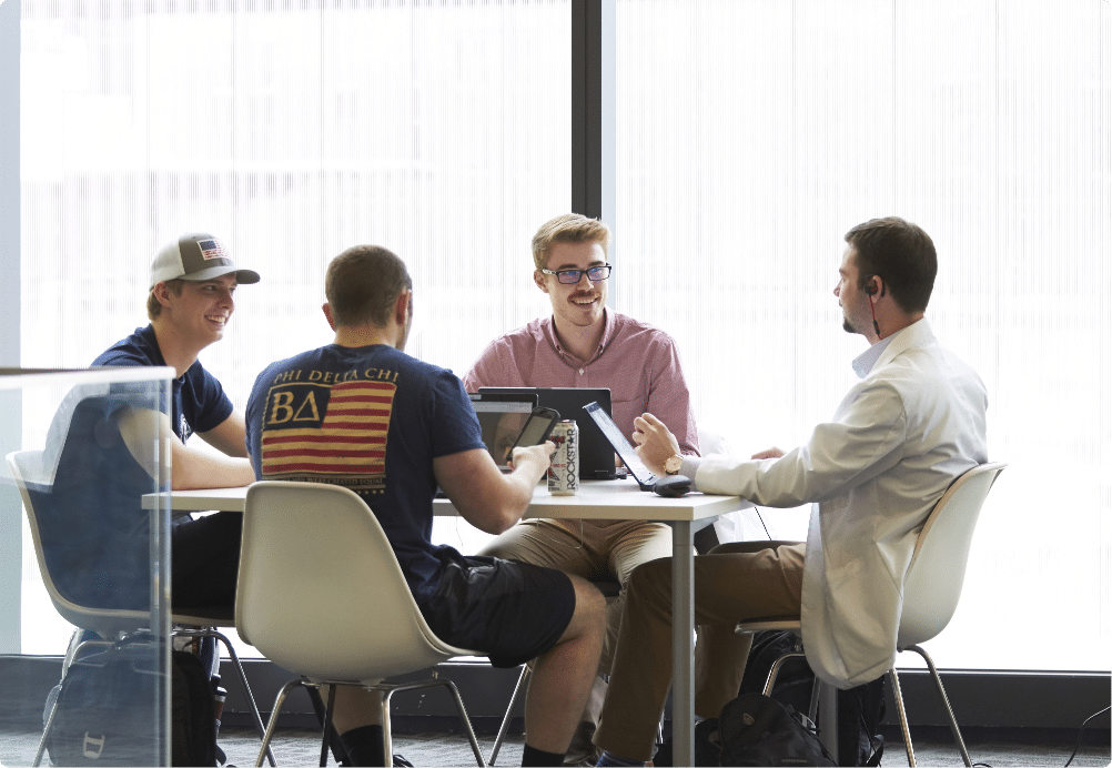 UHSP students gather together in the library to study.