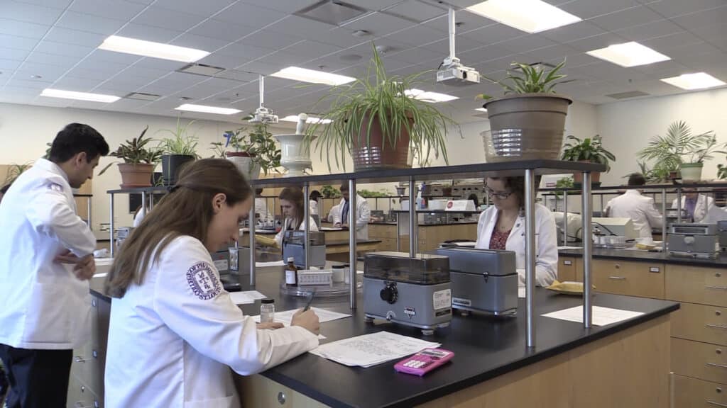 Students work in the pharmaceutics lab