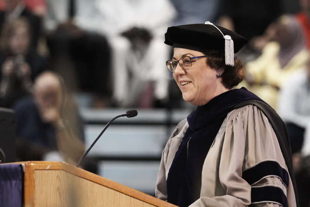 Board Chair, Joanne Levy speaking at Commencement