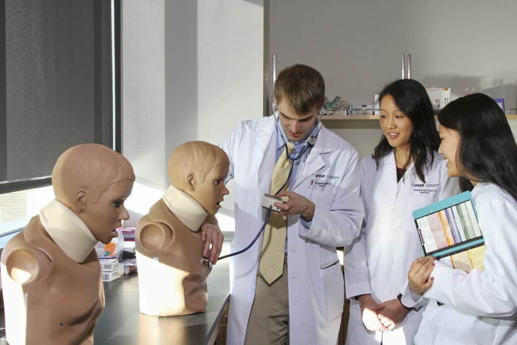 student pharmacists participate in hands-on learning in the skills lab