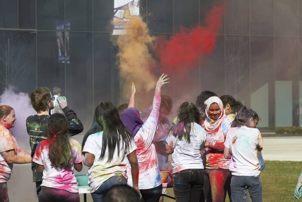 Students celebrate Holi on the UHSP quad