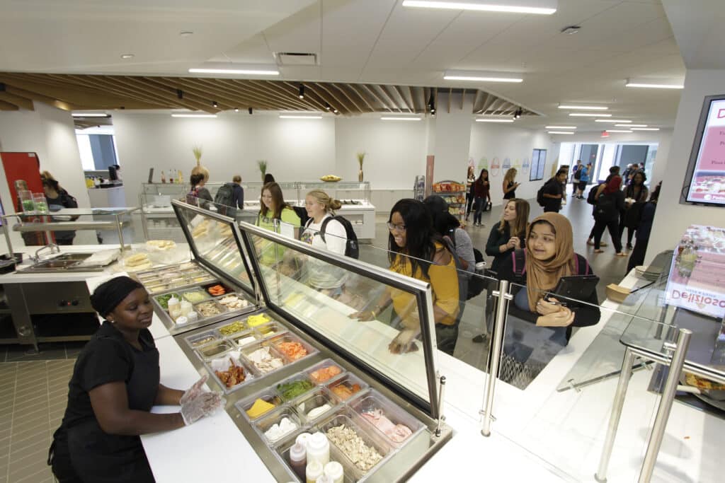 Students order lunch at the UHSP cafeteria