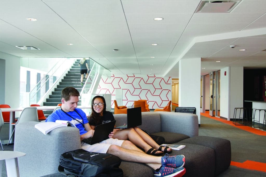 two students studyin the North Res. Hall common area