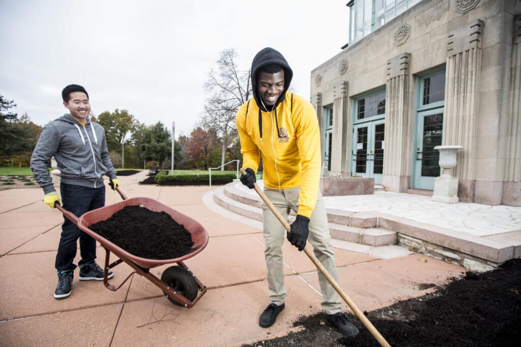 Students participate in community service at a local park