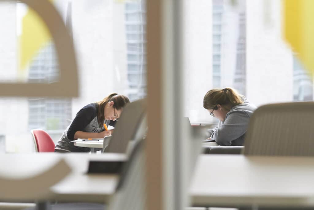 UHSP students studying in the library