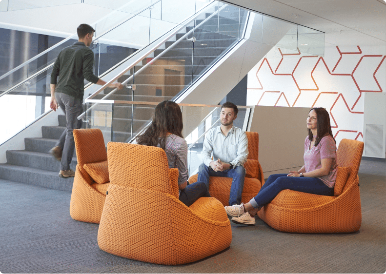 Students sitting on bean bags socializing