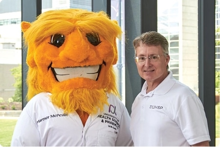 UHSP-mascot-with-David-Allen