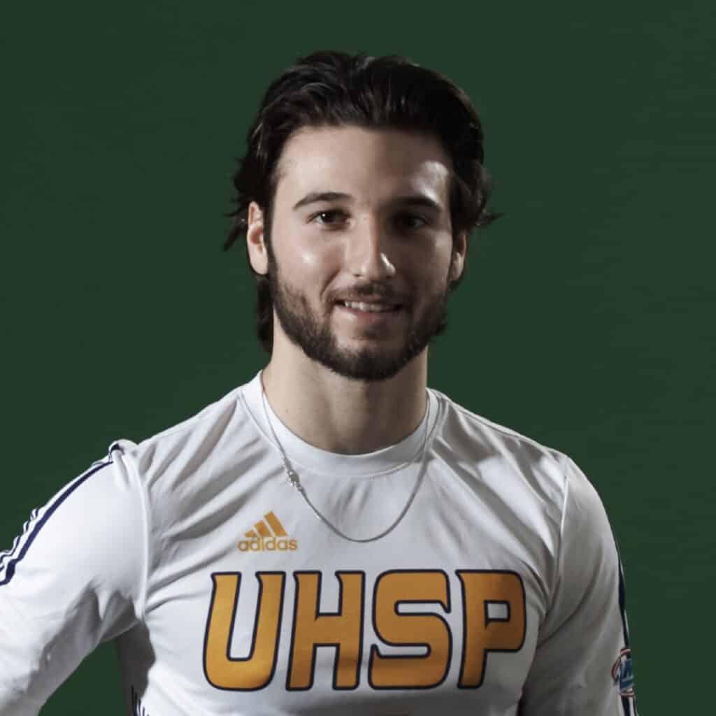 headshot of student soccer player, Jacob Woodard in front of green background