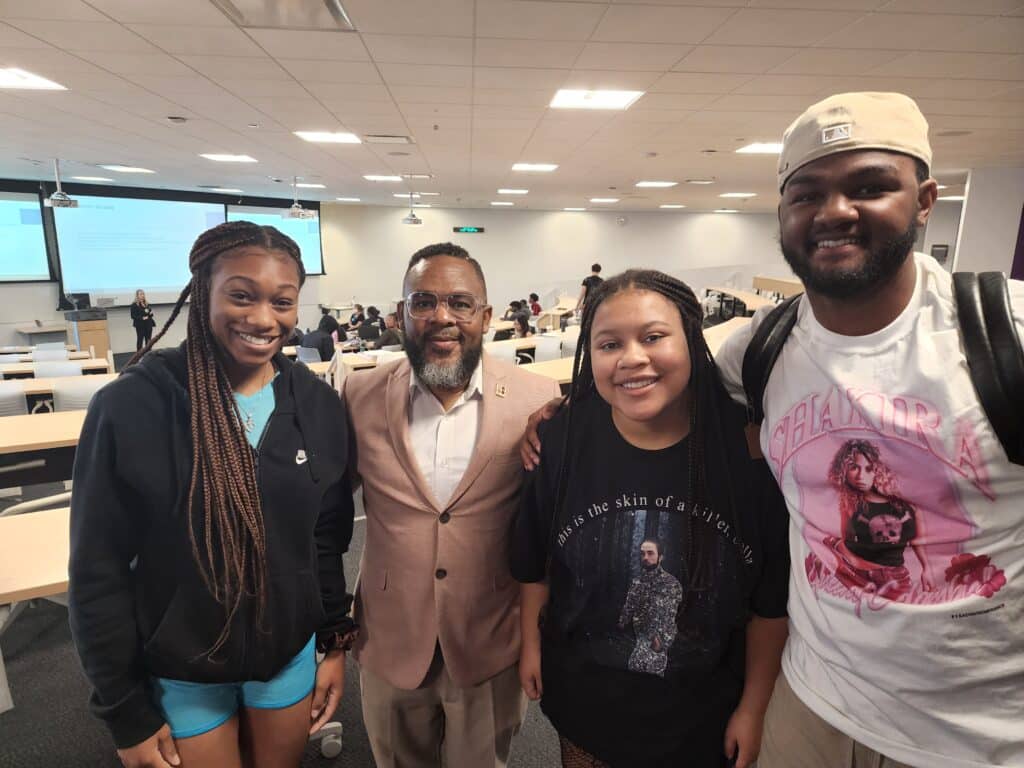 group of BESt summer campers smiling in lecture hall