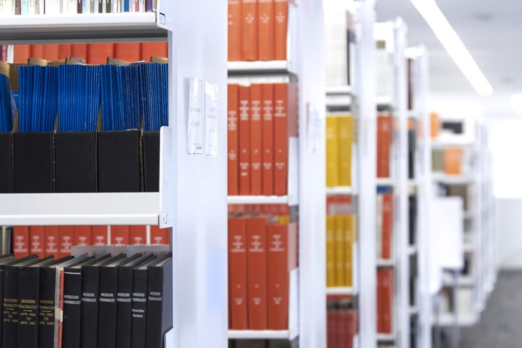 Rows of books in the UHSP library