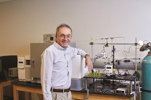 Faculty member Juan Rodriguez in his lab on campus