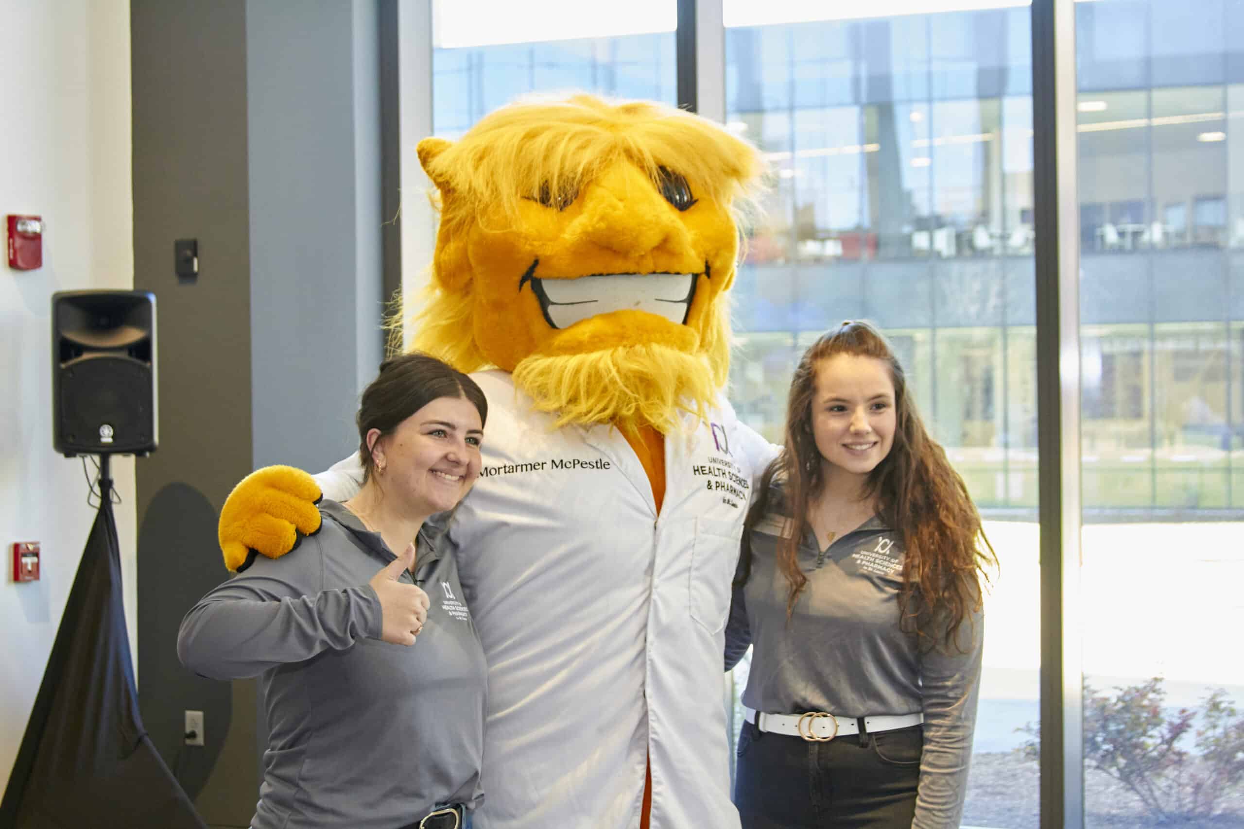 Students pose with Morty the Mascot during UHSP Preview Day