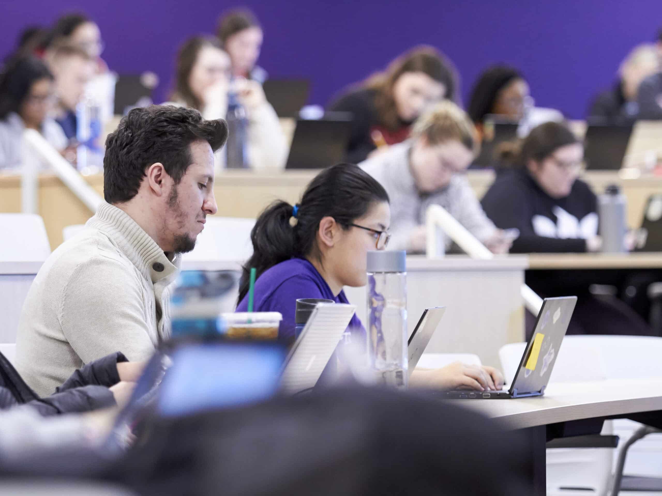 UHSP students work during class.