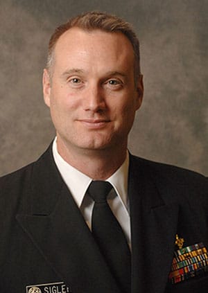 Headshot of alumnus Aaron Sigler